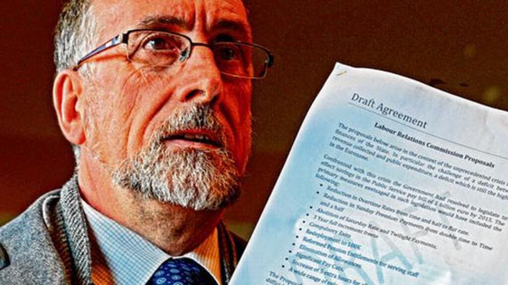 Shay Cody, chairman of Ictu Public Services Committee, with the draft agreement following talks on an extension to the Croke Park agreement this week. Photograph: Eric Luke/The Irish Times