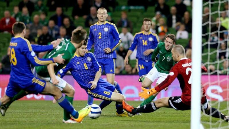 The Republic of Ireland’s Aiden McGeady (second right) crosses the ball which resulted in Kazakhstan’s Dmitriy Shomko (left) scoring an own goal during Tuesday’s World Cup qualifier at the Aviva Stadium. Photograph; Brian Lawless/PA Wire
