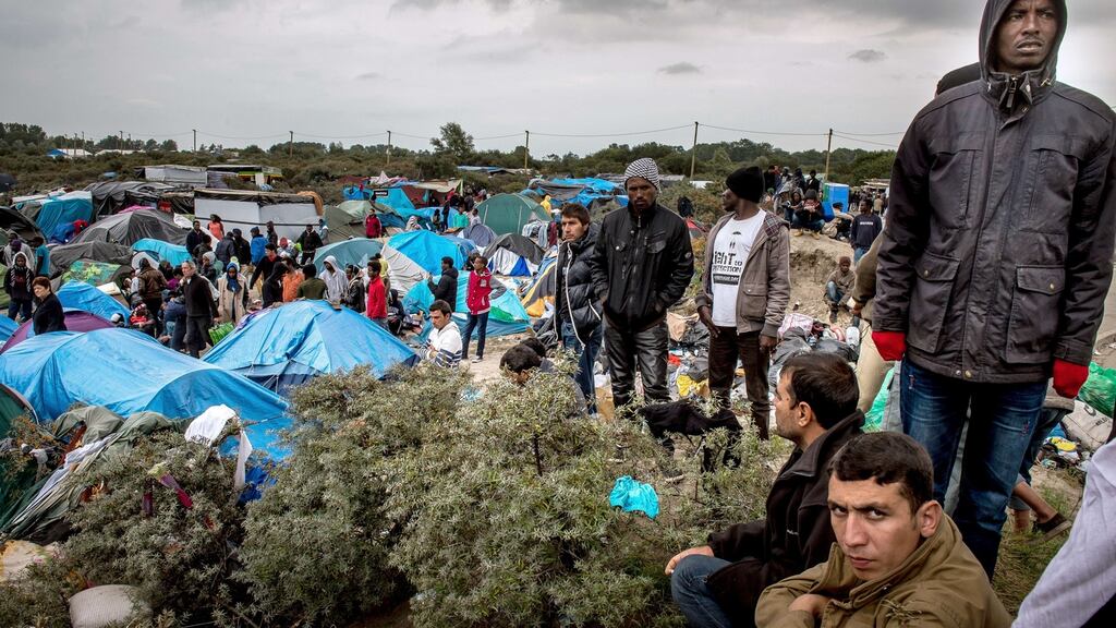 People at a site in Calais, France, dubbed the New Jungle, where some 3,000 have set up camp, September 21st, 2015. Most of them wish to reach England. Photograph: Philippe Huguen/AFP/Getty Images