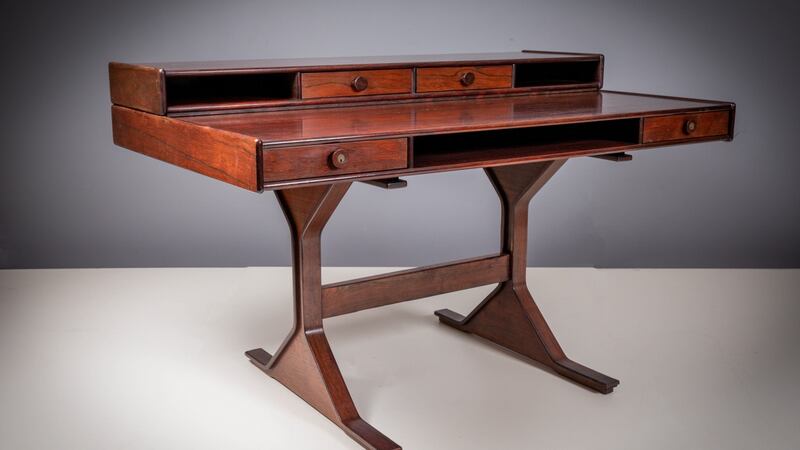 Rosewood Model 530 desk by Gianfranco Frattini, €1,500-€2,500.