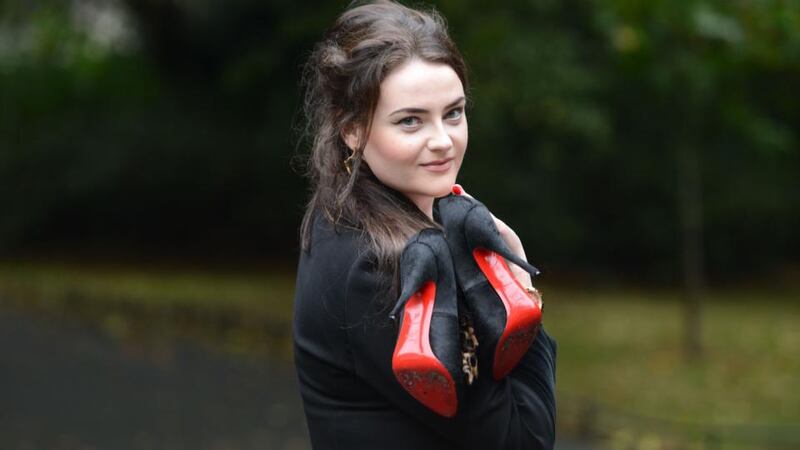 Katie Healy with a pair of Christian Louboutin shoes, which cost her €600. Photograph: Aidan Crawley