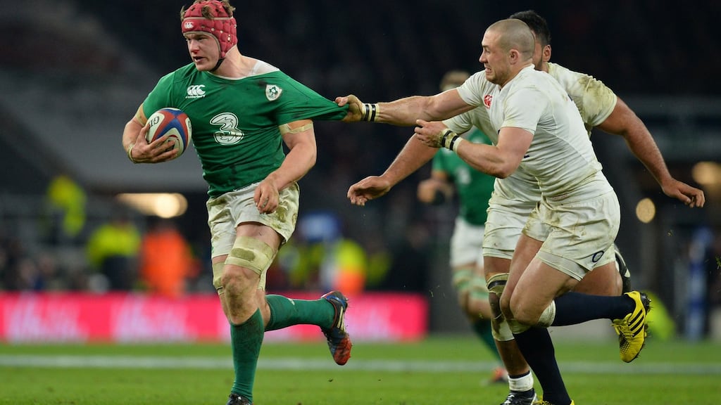 Josh Van der Flier in action against England’s Mike Brown during the Irishman’s debut in the Six Nations at Twickenham. Photograph: Glyn/AFP/Getty
