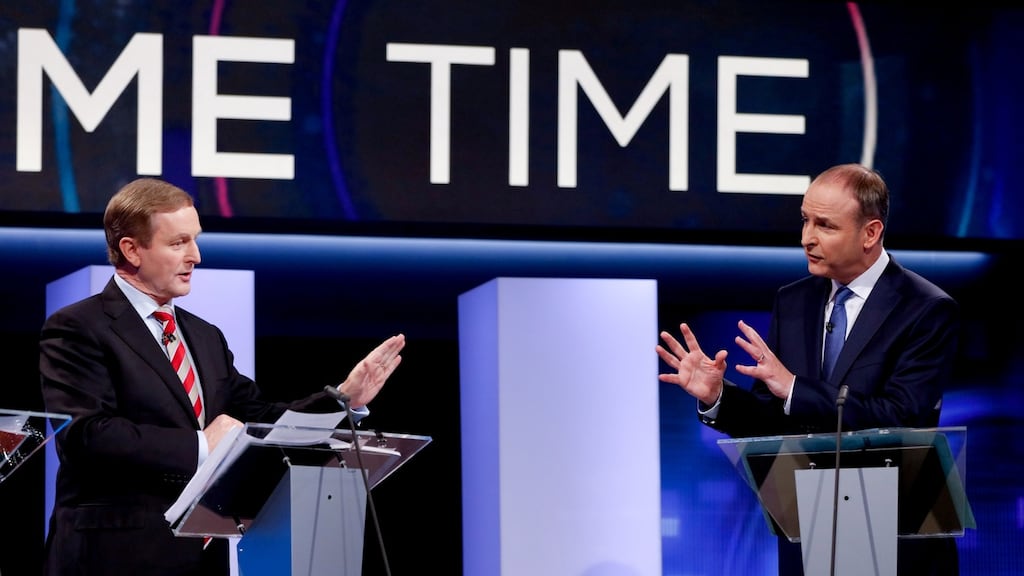 Taoiseach Enda Kenny and Fianna Fáil Leader Micheál Martin during the last television debate on RTÉ’s Prime Time before the election. Photograph: Tony Maxwell/PA Wire