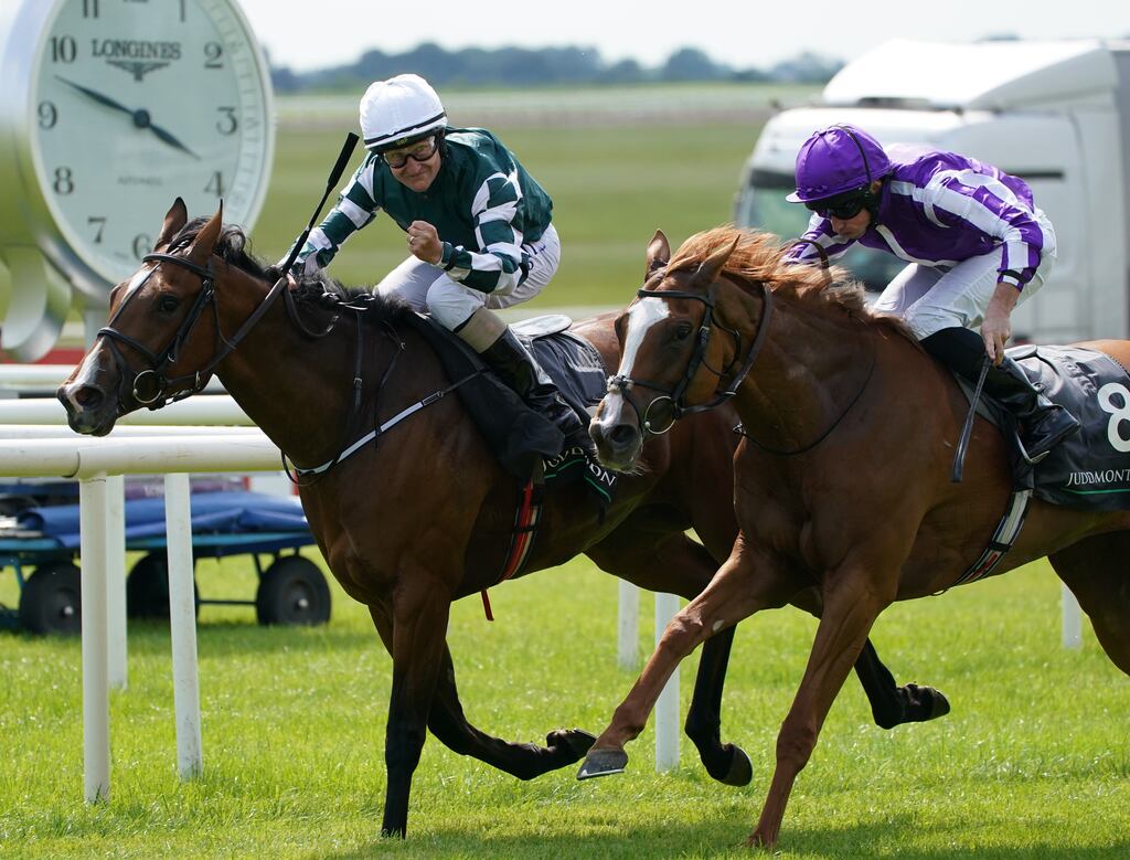 Magical Lagoon ridden by Shane Foley (left) on the way to winning the Juddmonte Irish Oaks at Curragh racecourse. Photograph: PA