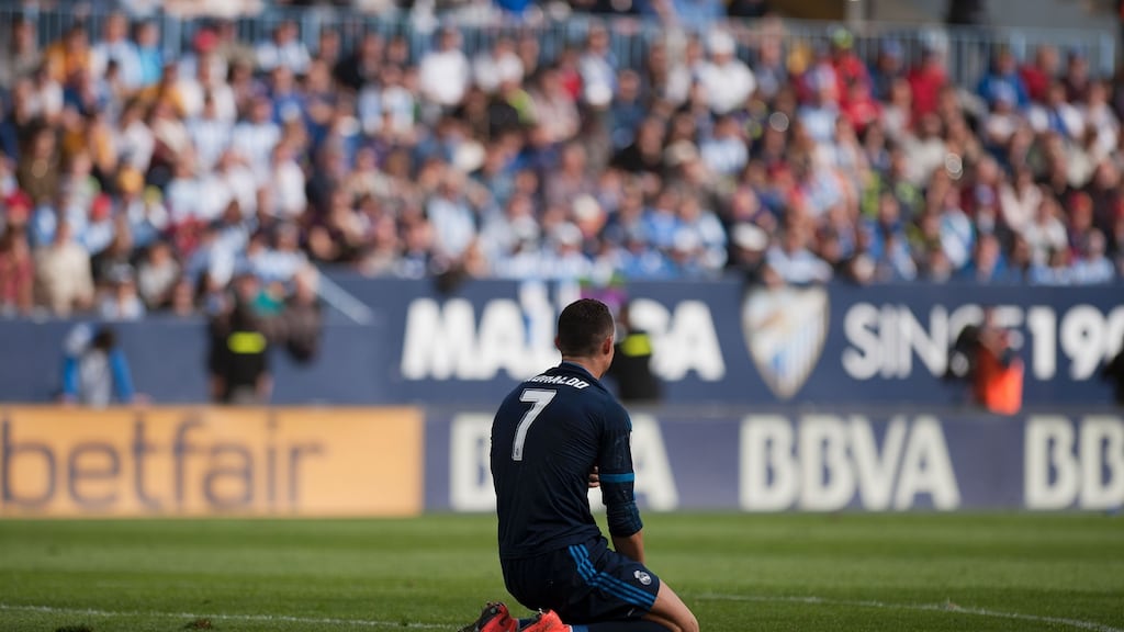 Real Madrid’s Cristiano Ronaldo looks on during his team’s draw at La Rosaleda stadium in Malaga. Photograph: Getty Images