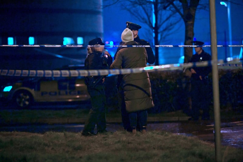 PSNI officers at the scene of the shooting in the Killyclogher Road area of Omagh. Photograph: Oliver McVeigh/PA