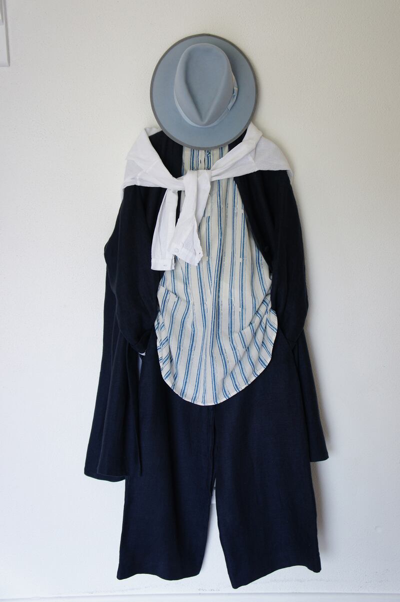 Navy Irish linen coat Û560, block printed pull over shirt Û310, navy Irish linen trousers Û260, Mylo light blue felt hat Û260.