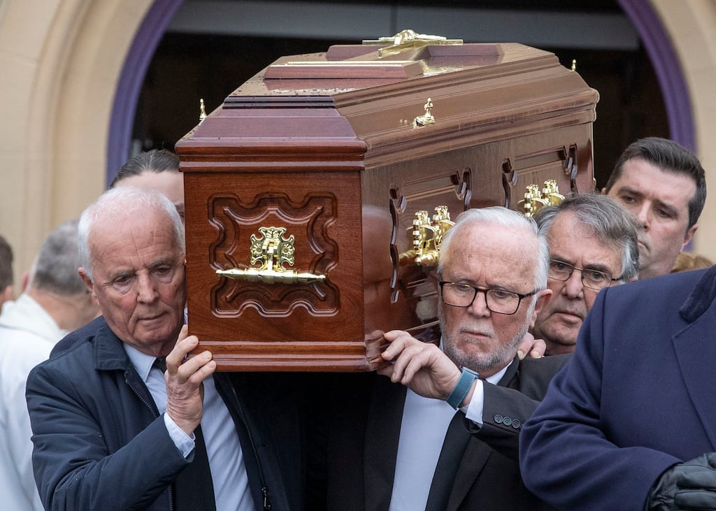 The remains of the late Mr Justice John Murray are carried from the Holy Rosary Catholic Church, Greystones, Co Wicklow, on Monday. Photograph: Tom Honan