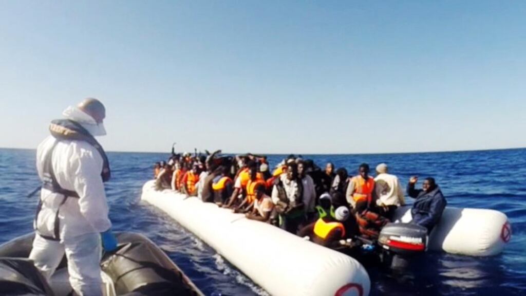 A handout video grab released by the Italian Coast Guard shows shipwrecked migrants being rescued in the Mediterranean Sea. Photograph: AFP
