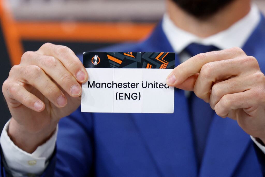 Former Spanish international Aritz Aduriz holds up Manchester United's slip during the Europa League round of 16 draw. Photograph: Valentin Flauraud/AFP via Getty Images