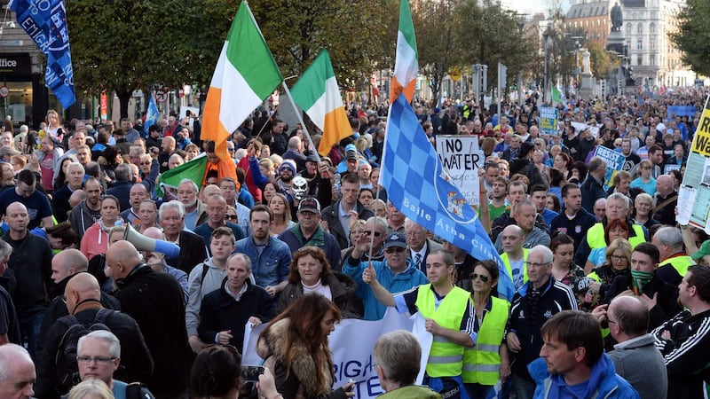 People taking part in the anti-water charges protest march today. Photograph: Eric Luke / The Irish Times