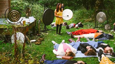Festival goers take time out for a sound bath session