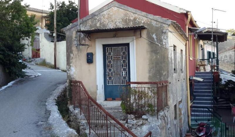 This stone house is in the traditional hilltop village of Giannades, in western Corfu