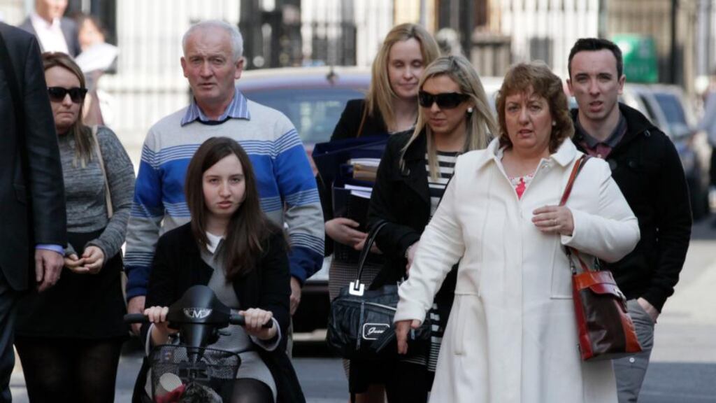 Mary Malee (15), of Bohola, Co Mayo, leaving the High Court today with family members and their legal team. Photograph: Collins Courts