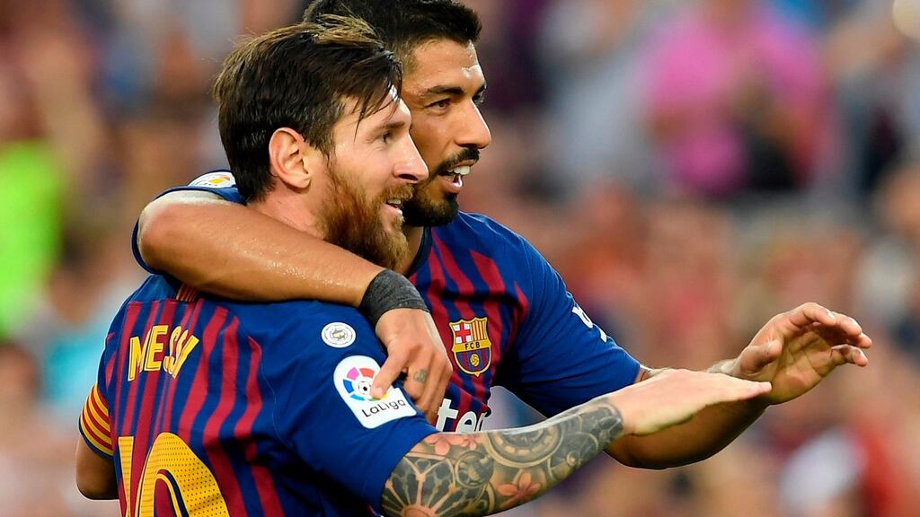 Barcelona’s Lionel Messi and Luis Suarez. Photograph: Lluis Gene/AFP/Getty Images