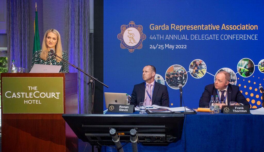 Minister for Justice Helen McEntee addressing the Garda Representative Association conference in Westport, with GRA deputy general secretary Ronan Slevin and outgoing GRA president Frank Thornton. Photograph: Conor Ó Mearáin