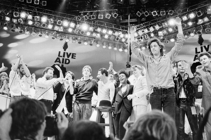 Bob Geldof with Bono and other performers at the Live Aid concert in July 1985 at Wembley Stadium in London. Photograph: BBC/Brook Lapping/Mirrorpix via Getty