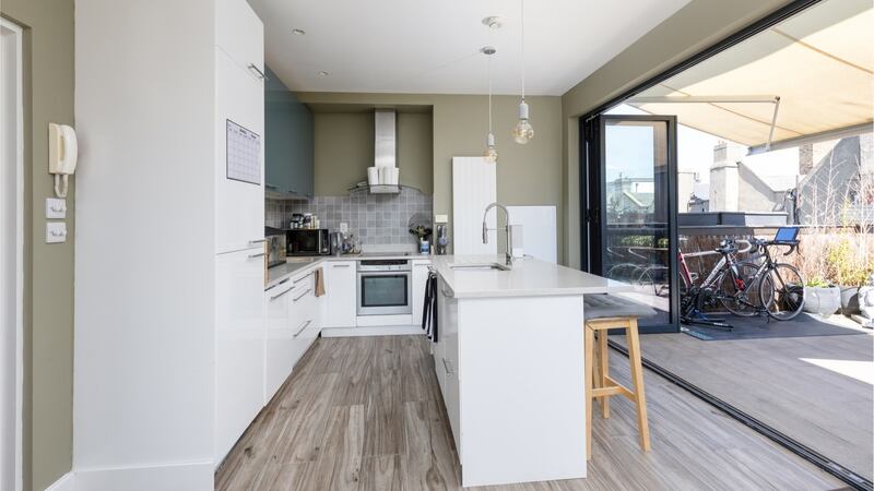 The kitchen and balcony area.