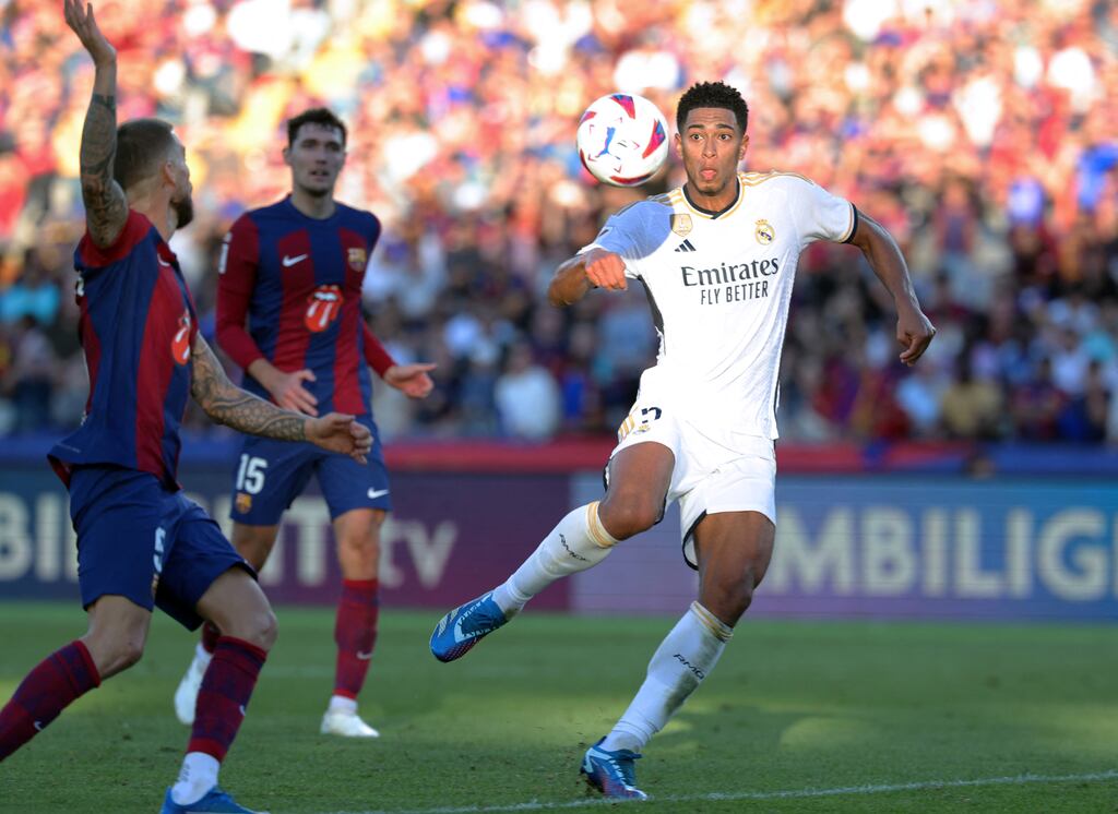 Jude Bellingham concentrates on the ball ahead of scoring Real Madrid's late winner in the La Liga match against Barcelona  at the Estadi Olimpic Lluis Companys. Photograph: Lluis Gene/AFP via Getty Images