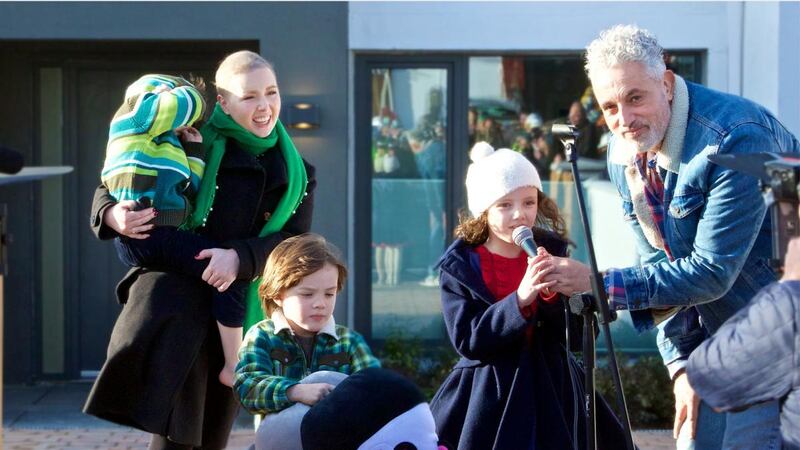 Baz Ashmawi with Laura Sheridan and her children in DIY SOS