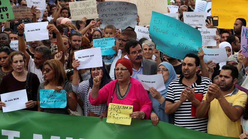 Muslims shout slogans during Monday night’s protest against terrorism in Barcelona. Photograph: Sergio Perez/Reuters