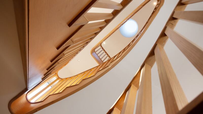 The atrium rooflight throws light down through the house