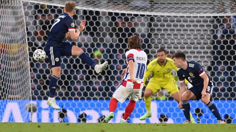 Luka Modric scores Croatia’s masterful second against Scotland. Photograph: Stu Forster/Getty/AFP