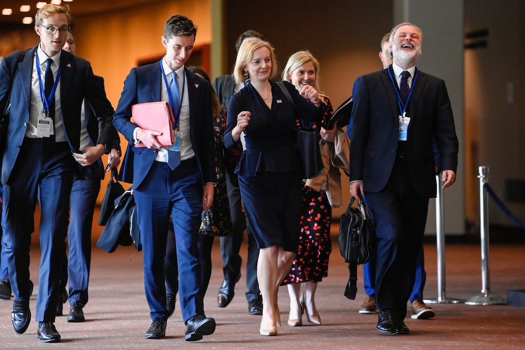 UK prime minister Liz Truss and her delegation, including her laughing national security adviser Tim Barrow, arrive at the UN in New York. Photograph: Toby Melville/PA