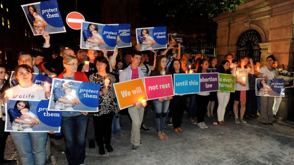 Anti-abortion protesters outside the Dáil  as the amendments to the Protection of Life During Pregnancy Bill were being voted on in 2013. Photograph: Dave Meehan