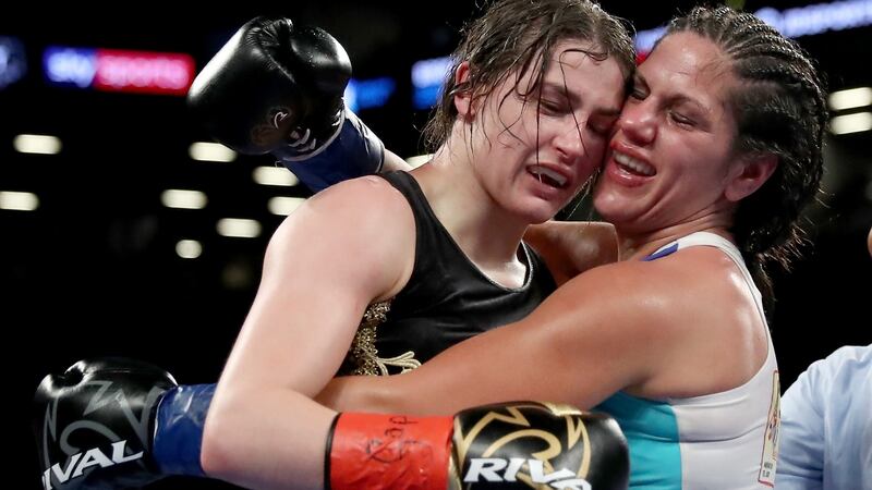 Katie Taylor and Victoria Bustos embrace after their fight in New York. Photograph: Elsa/Getty