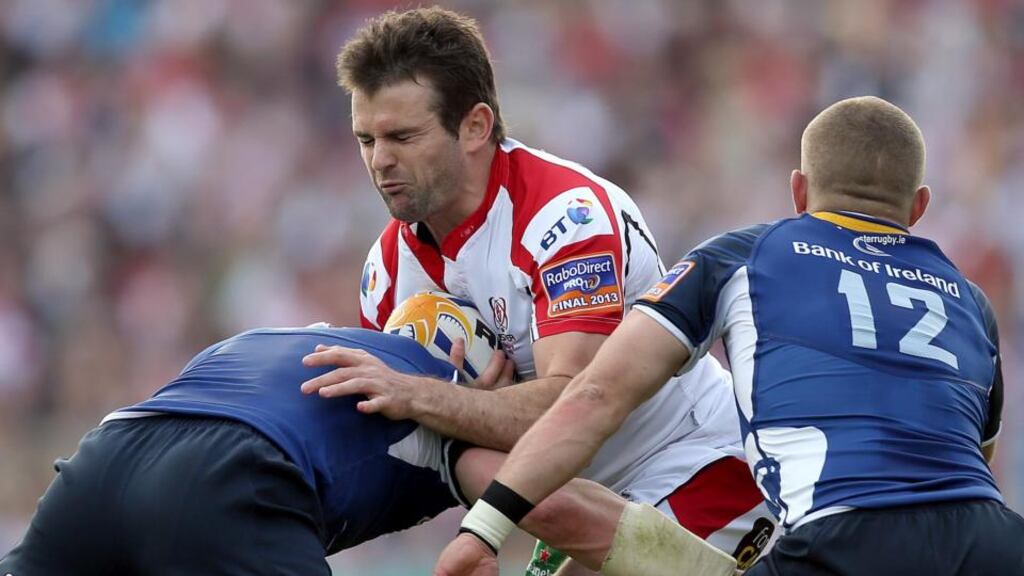 Ulster fullback Jared Payne is tackled by Leinster’s Shane Jennings and Ian Madigan during the RaboDirect Pro12 Final. Photograph: Dan Sheridan/Inpho