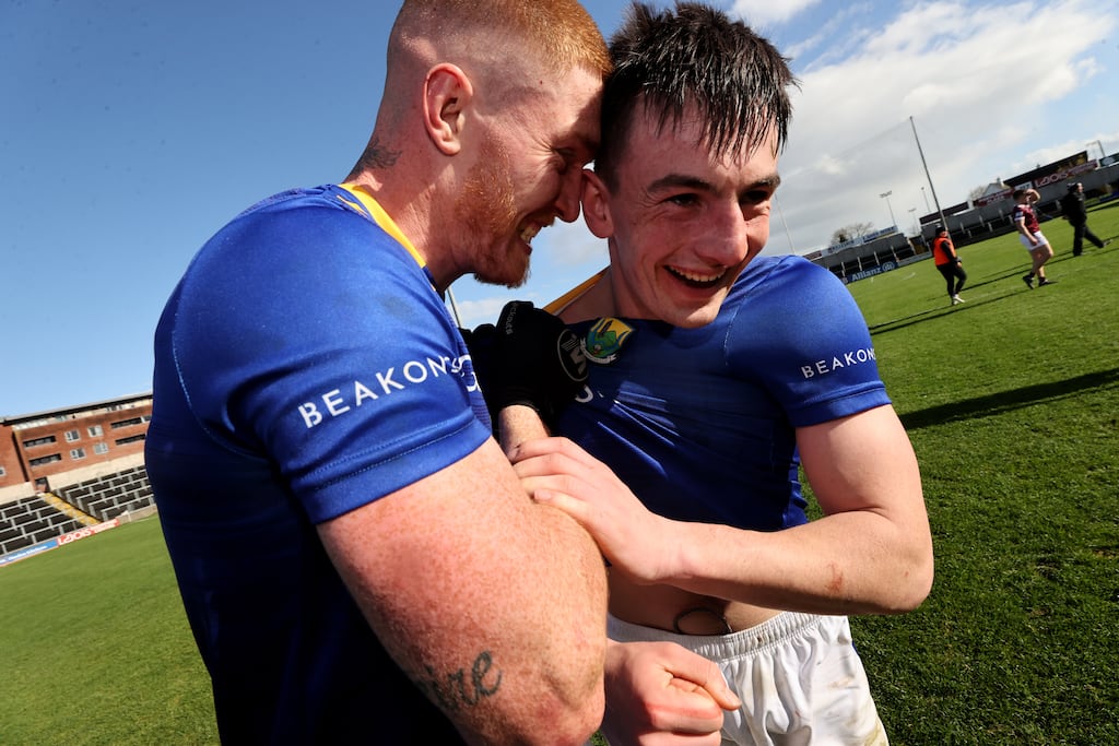 Wicklow's Jonathan Carlin and Cillian McDonald celebrate after their shock win over Westmeath at O'Moore Park. Photograph: Bryan Keane/Inpho