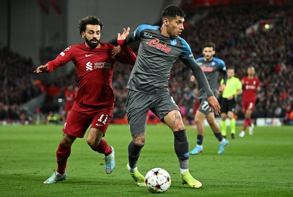 Liverpool's Mohamed Salah vies with Napoli's Mathias Olivera during their Uefa Champions League group A football game at Anfield. Photograph: Oli Scarff/AFP via Getty Images