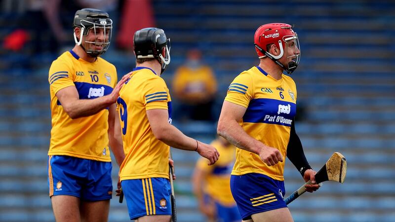 John Conlon, right, and Clare celebrate the win over Waterford. “The decision to move Conlon back to number six has been a great success. It was a big call to make . . .” said Jamesie O’Connor. Photograph: Ryan Byrne/Inpho