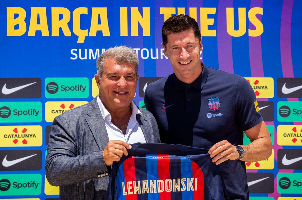 FC Barcelona president Joan Laporta with new signing Robert Lewandowski during the official welcoming ceremony. Photograph: EPA