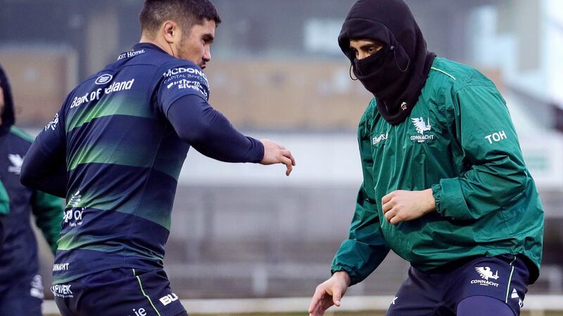 Jarrad Butler (L) and Tiernan O’Halloran train ahead of Connacht’s clash with Toulouse. Photograph: Laszlo Geczo/Inpho