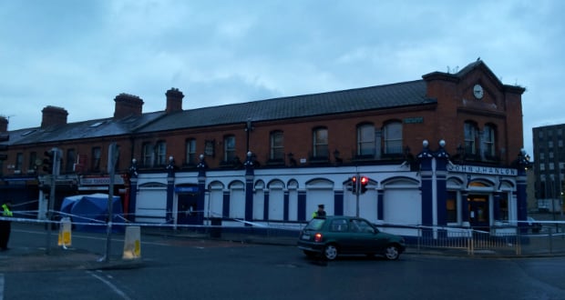The scene at Hanlon’s Corner this morning as gardaí closed the Old Cabra Road after a multiple shooting incident. Photograph: Peter Smyth/The Irish Times