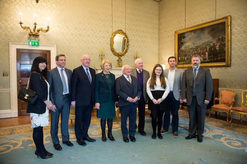 President Michael D Higgins with John Joyce great-grandson (right of President) of John Joyce, victim of the Maamtrasna murders in 1882. President Higgins pardoned Myles Joyce a first cousin who was hanged for the murder. Photograph: Brenda Fitzsimons/The Irish Times