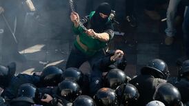 Ukraine approves corruption laws as Kiev hit by violent clashes
