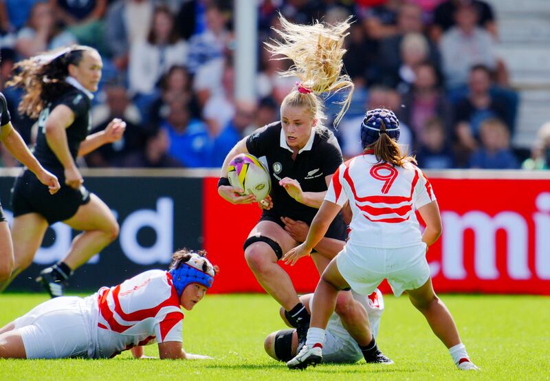 New Zealand's Jorja Miller is challenged by Japan's Moe Tsukui during their Pool C match at Sandy Park, Exeter on Sunday. Photograph: Ben Birchall/PA Wire