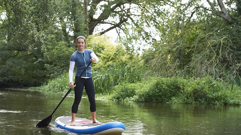 Think there’s nothing to do? There are plenty of places to go and great adventures to be had in the days ahead. Paddleboarding, for example. Photograph: Getty Images