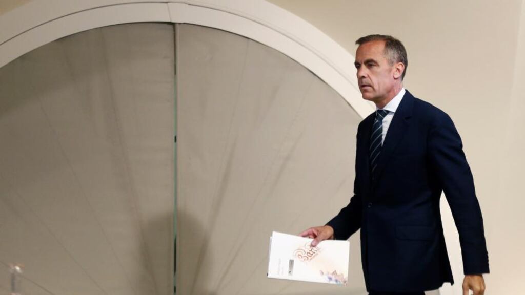 Mark Carney, governor of the Bank of England, arrives to attend a news conference in London. Photographer: Simon Dawson/Bloomberg