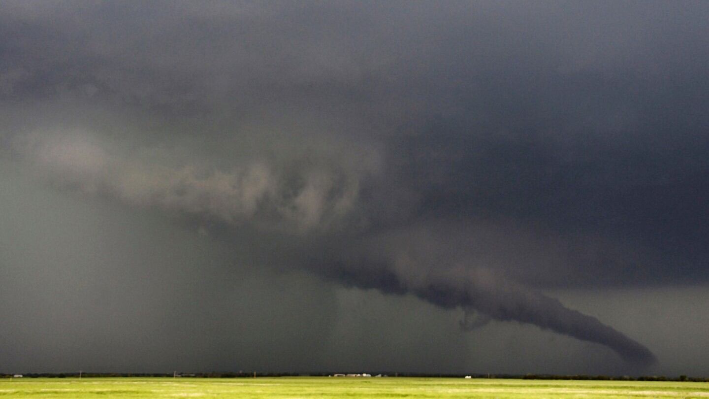 The funnel of a tornadic thunderstorm almost touches the ground near South Haven. Photograph: Gene Blevins/Reuters