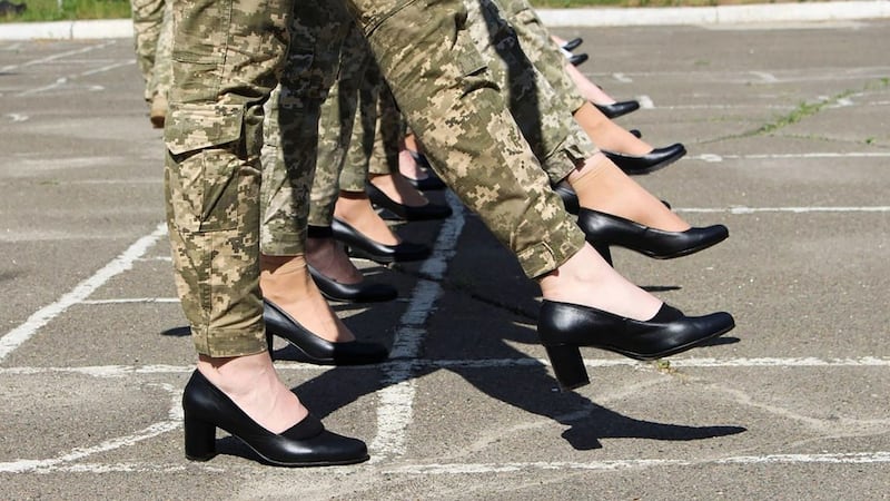 The heels are part of the female cadets’ dress uniform worn for formal occasions, but such shoes are not worn with field uniforms. Photograph: Ukrainian defence ministry press/AFP via Getty Images