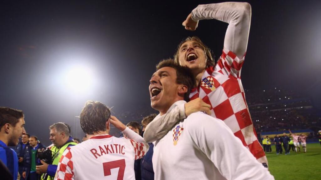 Mario Mandzukic of Croatia celebrates with team-mate Luka Modric after the World Cup Qualifier play-off second leg match between Croatia and Iceland at Maksimir Stadium in Zagreb, Croatia. Photograph: Alex Grimm/Getty Images