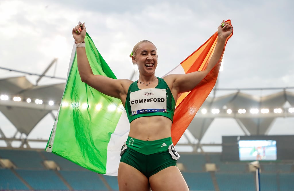 Ireland's Orla Comerford celebrates winning her second gold medal of the World Para Athletics Championships with victory on the T13 200m final in New Delhi. Photograph: Nikola Krstic/Sportsfile