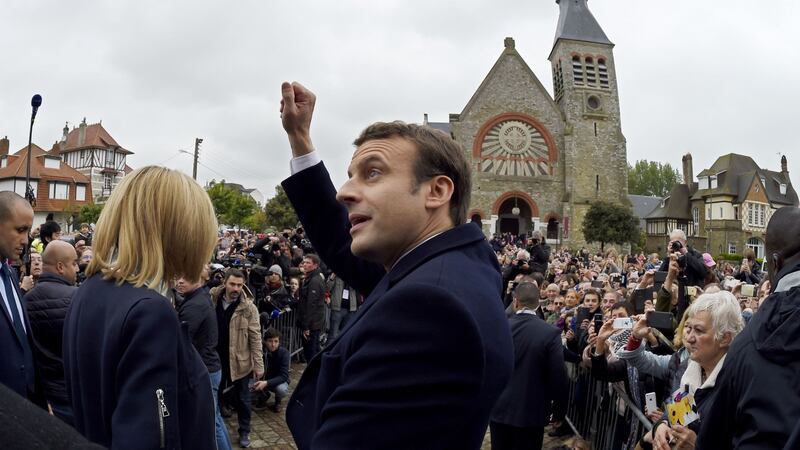 French president-elect Emmanuel Macron waves to supporters after voting in Le Touquet, northern France, on Sunday. Photograph: Eric Feferberg/AFP/Getty Images