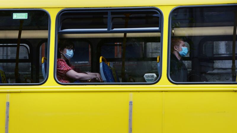 Passengers wearing face coverings on public transport in Dublin. Photograph: Alan Betson/The Irish Times