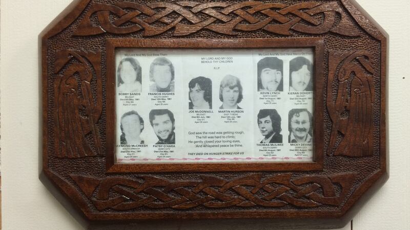 An early commemorative plaque to the hunger strikers. It is likely that the maker measured the mass card and built the wooden frame to the correct size. The corresponding image would have been inserted when it left the prison. POPS Centre. Derry. Photograph: Alison Mac Cormaic