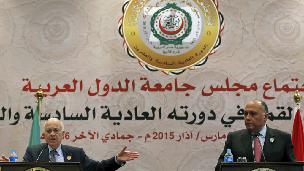 Arab League secretary general Nabil Elaraby (l) and Egypt’s foreign minister Sameh Shoukry answer questions from journalists during a news conference after the closing session of the Arab Summit in Sharm el-Sheikh. Photograph: Amr Abdallah Dalsh/Reuters